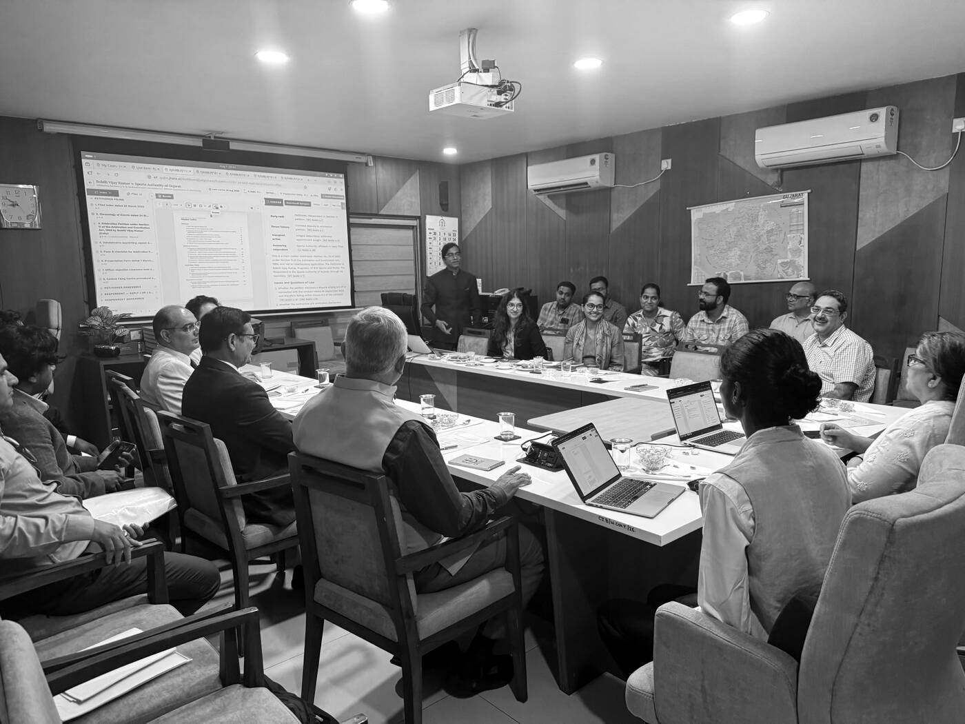 The jhana team demonstrating the system to a committee of judges and registry officials at the High Court of Gujarat.